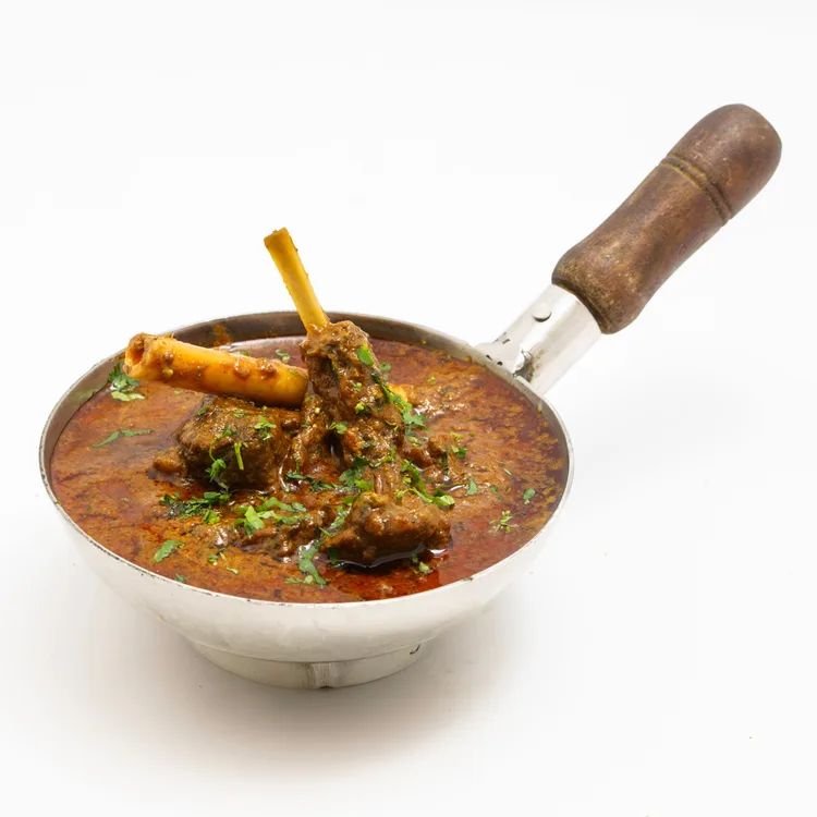 Curry goat served at Indian Bell