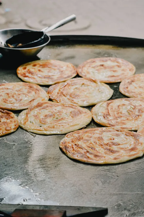 Kerala paratha served at Indian Bell