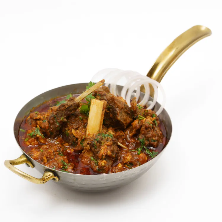 Curry lamb served at Indian Bell
