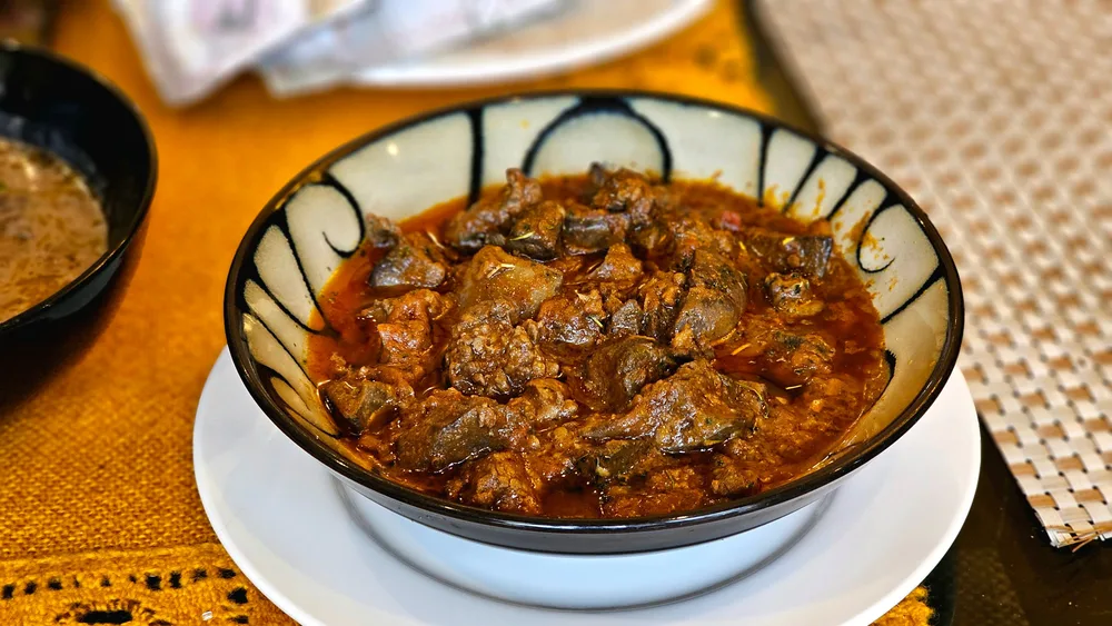 Madras curry lamb served at Indian Bell
