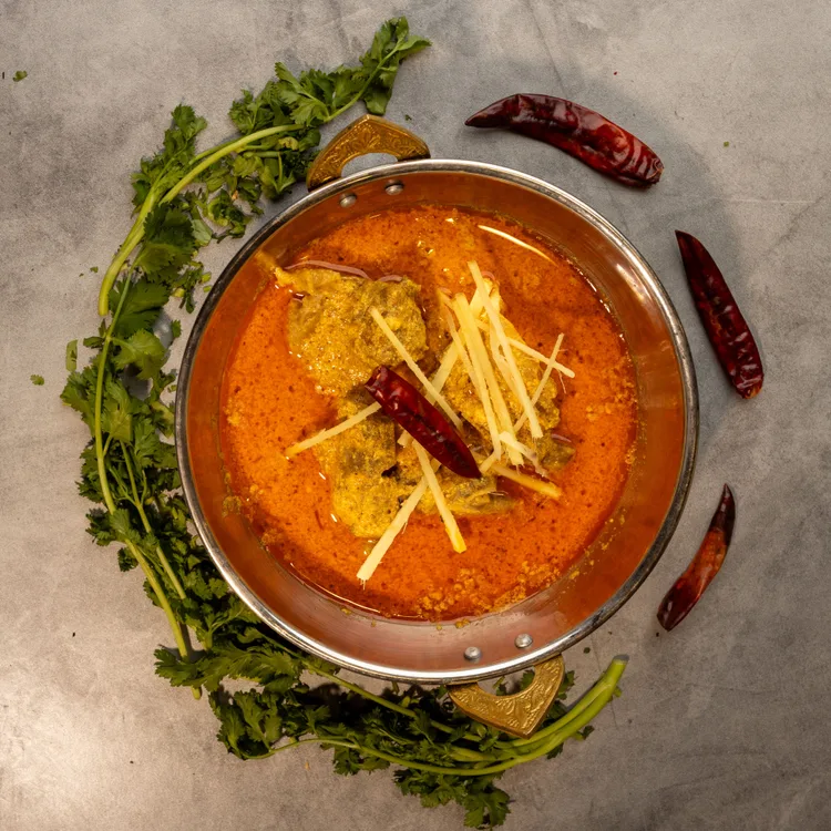 Malai korma lamb served at Indian Bell