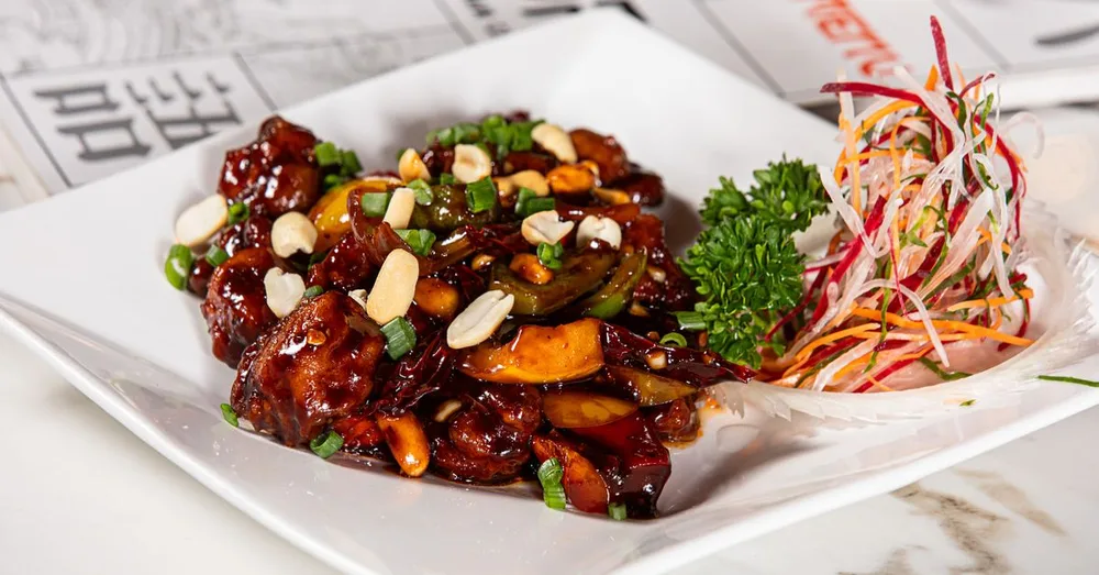 Schezwan chicken served at Indian Bell